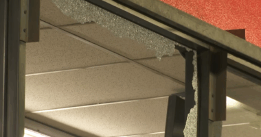 Shattered window at the L.A. AutoZone following the looting