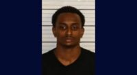 Man allegedly shoots at dad with 2 kids