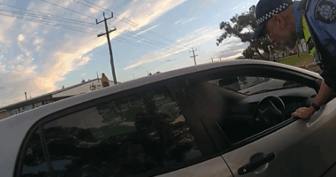 A man has been caught allegedly driving under the influence after police noticed a beer bottle sitting on the roof of his car. ﻿