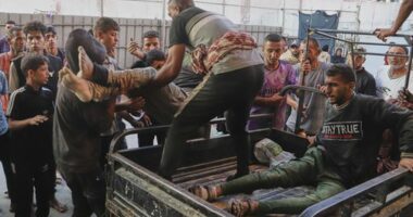 Palestinians who were injured during a food distribution at a center run by the Gaza Humanitarian Foundation, a U.S.-backed organization approved by Israel, are brought to Nasser Hospital in Khan Younis, southern Gaza Strip, Saturday, July 19, 2025. (AP Photo/Mariam Dagga)