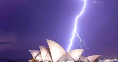 New South Wales was battered last night by an unseasonal storm that unleashed 100,000 lightning strikes across the state.