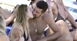 Novak Djokovic packs on the PDA with wife Jelena as duo enjoy kiss during luxury holiday - at Greek resort where champagne can cost £100,000!