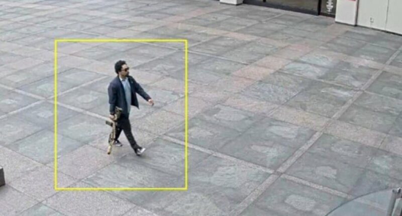 Officials work to unravel how and why gunman carried out deadly attack on NYC office building