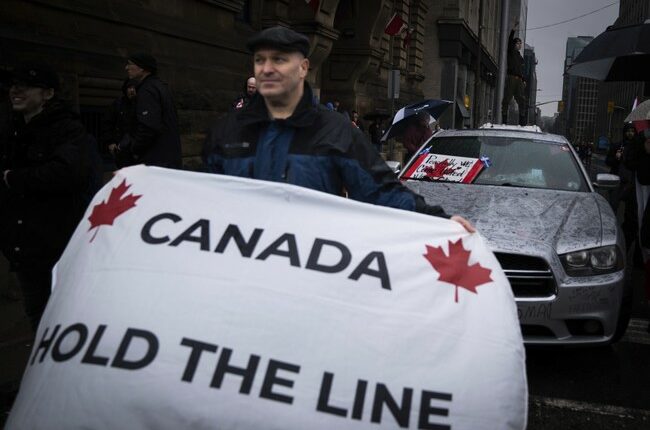 Oh, Commieda: After Canada Bans Christian Singer's Shows, Cops Allow Antifa Thugs to Throw Smoke Bombs