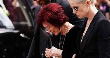 Ozzy Osbourne's family gather to lay him to rest in the grounds of his mansion in front of huge tongue-in-cheek sign with stars including Elton John among mourners