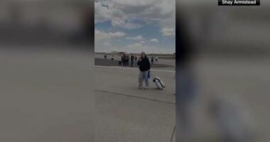those on board were evacuated on the runway, according to American Airlines and Denver International Airport.