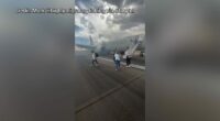Passengers forced to evacuate American Airlines flight on runway due to tire issue: company