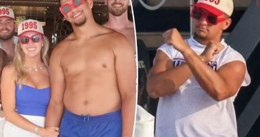 Patrick Mahomes flexes ‘dad bod’ muscles alongside wife Brittany during Fourth of July yacht party in Miami