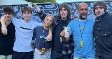 Pep Guardiola parties with the Gallagher family backstage before Oasis comeback gig - as he rocks a retro Man City shirt
