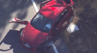 An early-morning police chase has ended with a man wanted over alleged domestic violence ejected from his car and fighting for his life in a Sydney hospital.﻿