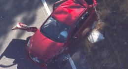 An early-morning police chase has ended with a man wanted over alleged domestic violence ejected from his car and fighting for his life in a Sydney hospital.﻿
