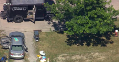 Police say waiting shooter ambushed 2 Ohio officers parked for lunch and seriously injured a third