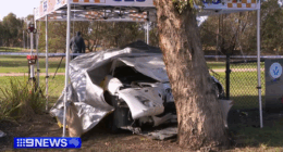 The mangled car remained on scene in Roxburgh Park while detectives investigated.