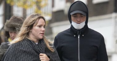 Pregnant Suki Waterhouse sparks engagement rumours as she shows off stunning diamond ring during a stroll with partner Robert Pattinson - ahead of welcoming their first child