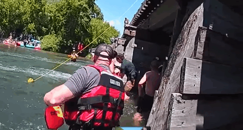 Ranger rescues paddleboarder trapped under bridge on Utah river   