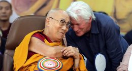 Richard Gere kisses the hand of the Dalai Lama