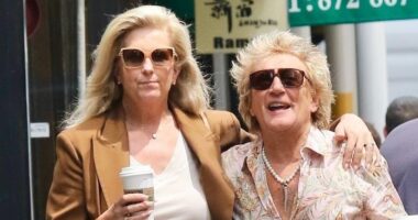 Rod Stewart, 80, and his wife Penny Lancaster, 54, look as loved-up as ever as they wrap their arms around each other on New York stroll