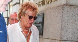 Rod Stewart, 80, cuts a dapper figure in pearl necklace and open-necked shirt as the stylish star steps out in New York City