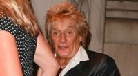 Rod Stewart, 80, wears a quirky satin blazer as he joins his leggy wife Penny Lancaster, 54, in New York City