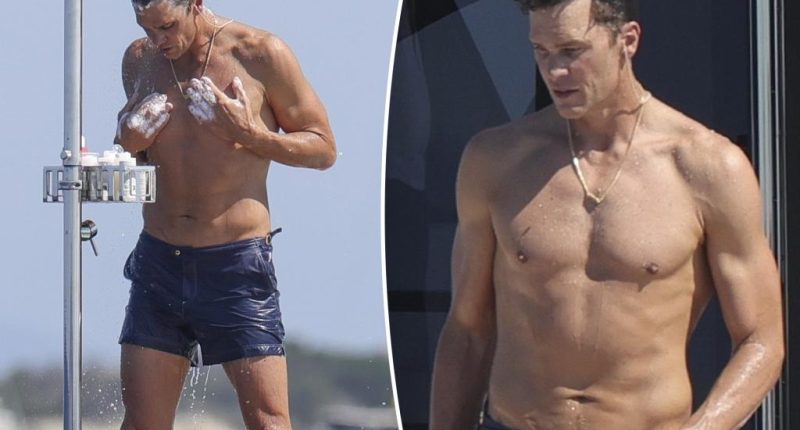 Shirtless Tom Brady rinses off in outdoor shower while yachting in Ibiza on Fourth of July