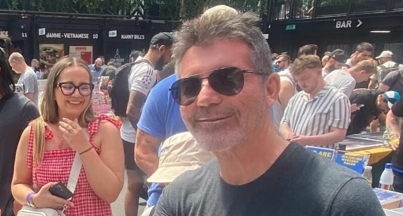 Simon Cowell drops thousands on a rare Pokémon card at a trading show
