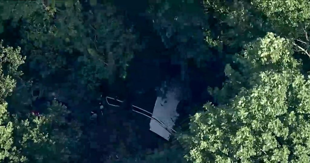 Skydiving plane goes off New Jersey runway into woods, sending 15 to hospital