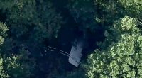 Skydiving plane goes off New Jersey runway into woods, sending 15 to hospital