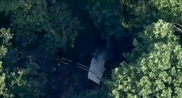 Skydiving plane goes off New Jersey runway into woods, sending 15 to hospital