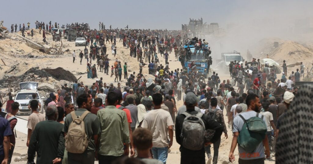 The food is just outside the border. But getting it to Gaza's starving is a chaotic process