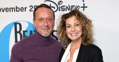 Tim McGraw Steps Out in Copenhagen With Faith Hill and a Cane After Surgery