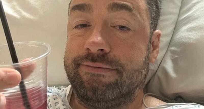 Top comedian shares photo from hospital bed after being rushed to A&E