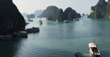 Tourist boat capsizes during a thunderstorm in Vietnam, leaving 18 dead and 23 missing