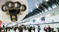 The knuckledusters seized at Perth Airport (inset) and the domestic terminal.