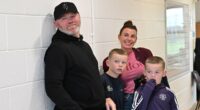 Wayne and Coleen Rooney watch their son Kai, 15, play for Man United