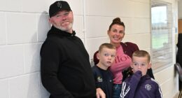 Wayne and Coleen Rooney watch their son Kai, 15, play for Man United