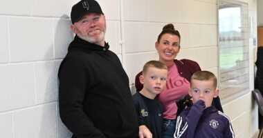 Wayne and Coleen Rooney watch their son Kai, 15, play for Man United