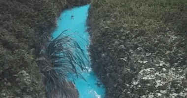 A passerby noticed the colour of the creek yesterday.