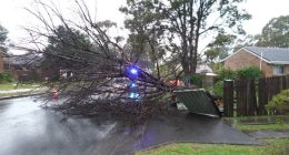 Wild weather knocks out power, cuts trains and threatens homes
