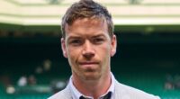 Will Poulter wears wonky trousers and odd socks for Wimbledon