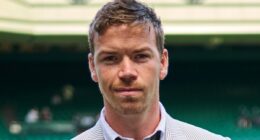 Will Poulter wears wonky trousers and odd socks for Wimbledon