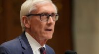 Wisconsin's Democratic governor reaches budget deal with Republicans to cut taxes, fund university