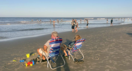 ‘You just got to be careful’: Swimmers take to New Smyrna Beach after shark bite