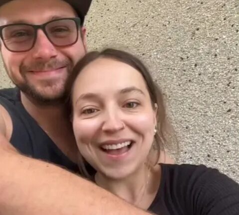 Happy couple embracing.