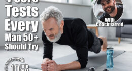 strong man with grey hair doing plank on fitness mat near dumbbells and sports bottle in living room. 4 Core Tests Every Man Over 50 Should Try Before It