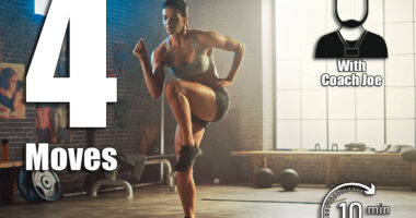 Strong and Fit Beautiful Athletic Woman in Sport Top and Shorts is Doing March and Twist Exercises in a Loft Style Industrial Gym with Motivational Posters. It