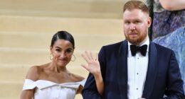 AOC busted for bending 'spouse' rules with fiancé Riley Roberts