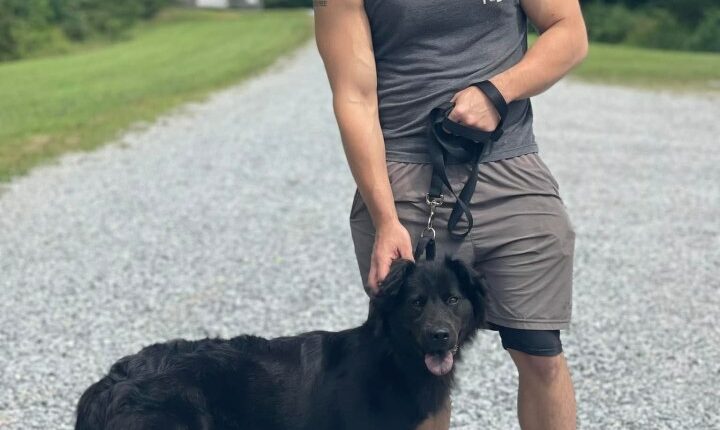 Adam Turck with his dog.