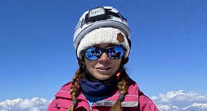 Bid to save woman stuck on mountain with broken leg is called off