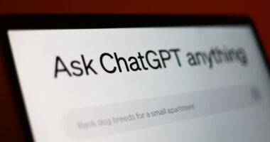 Illustration of a laptop displaying the ChatGPT website.