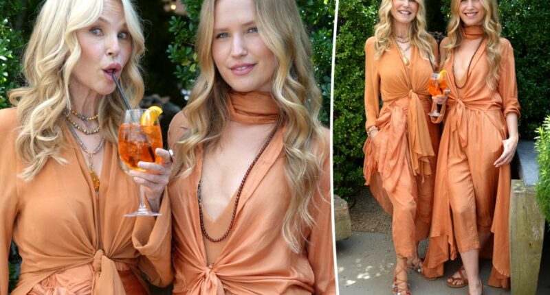 Christie Brinkley and daughter Sailor, 27, twin in matching orange looks